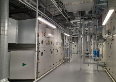 interior of factory showing machinery and pipework