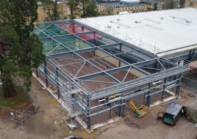 steel frame of new building attached to current building