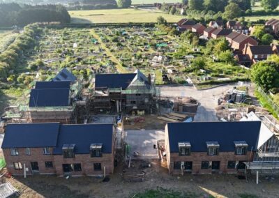 new houses being built with allotments behind