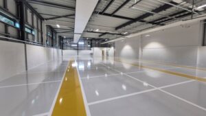 interior room of new college building with white lines on floor