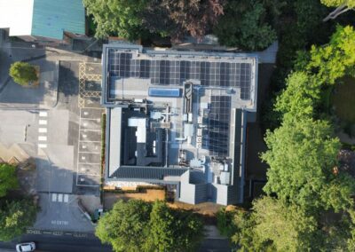 aerial view of new college building showing roof with solar panels