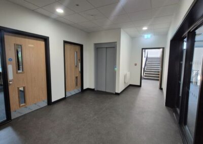 college corridor with lift and stairs