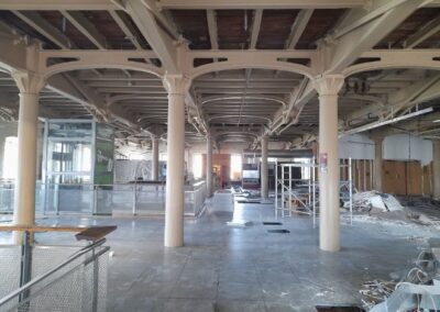 pillars across room being prepared for refurbishment